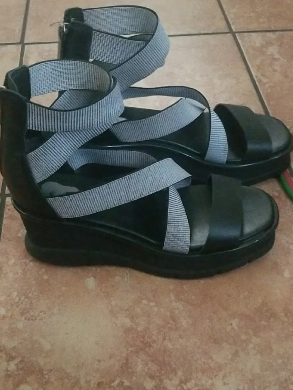 Sorel Black Sandals with White Striped Crisscross Straps